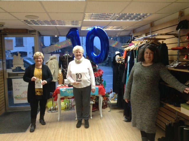 Shop manager Lynne Whitehall, long-serving volunteer Rosalind Chew and assistant manager Emily Thornhill