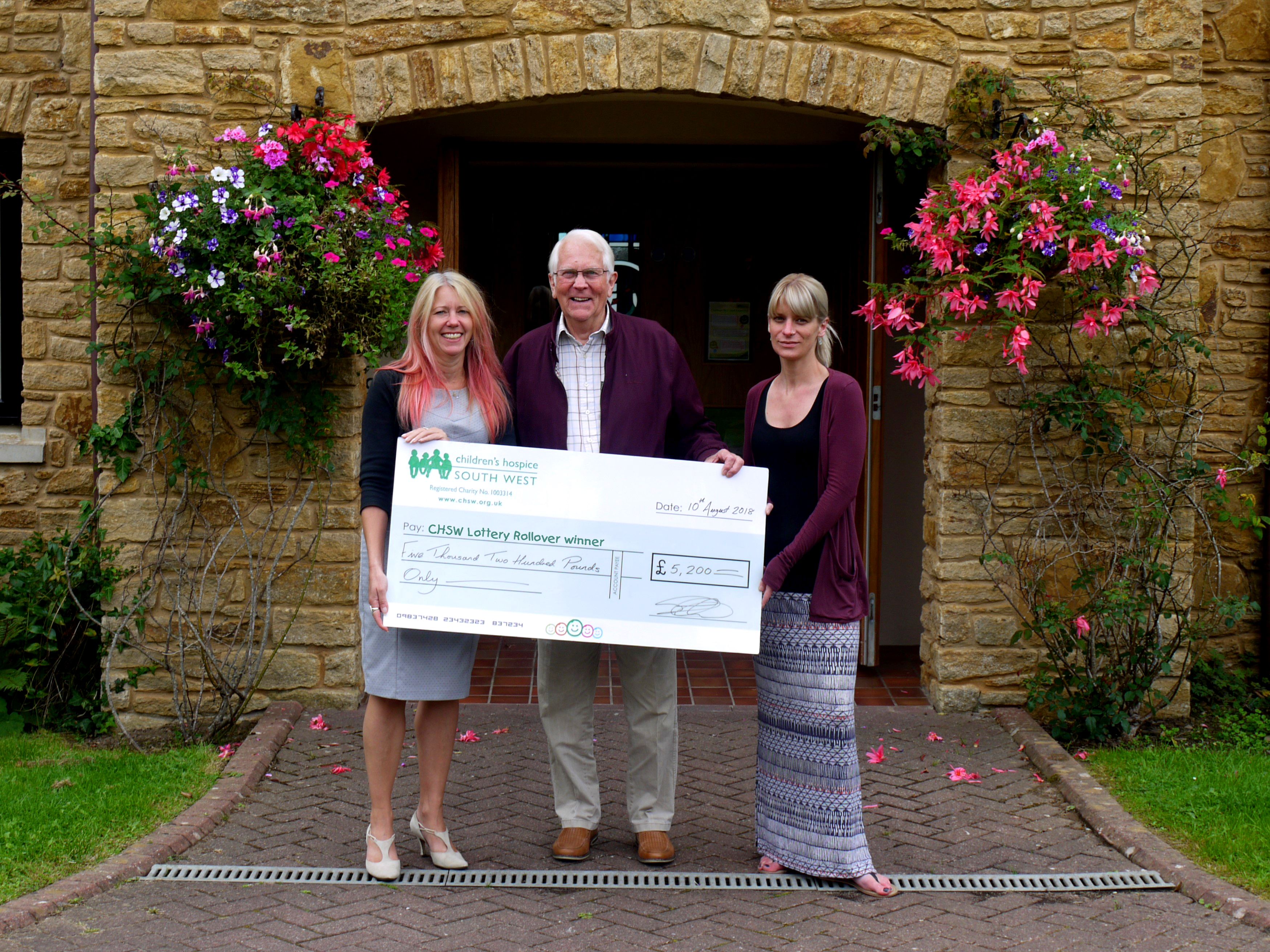 Norman-collects-cheque-from-Little-Bridge-House