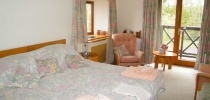 Family accommodation - bedroom at Little Bridge House thumbnail