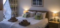 Little Harbour family accommodation - double bedroom  thumbnail