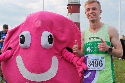 Man taking part in the Plymouth Half for CHSW