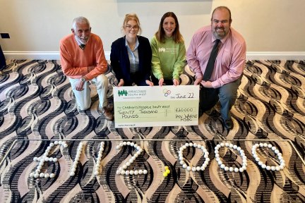 Organisers of the event celebrate £20,000 being raised at the recent golf day