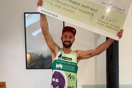 Johnny Hesnan with his donation for Children's Hospice South West