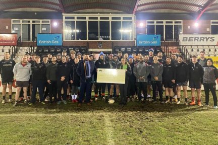 The donation is presented at Taunton Rugby Club