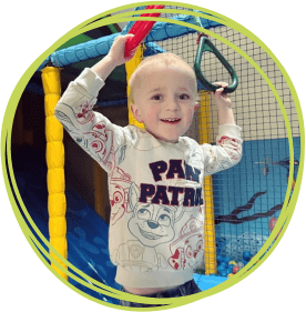 Boy playing in soft play