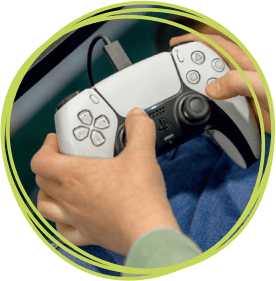 Hands holding a gaming controller