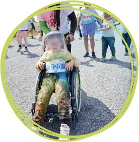 boy in a wheelchair at Rainbow Run