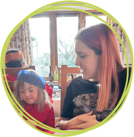 Esme and her sister enjoying Christmas lunch together at the hospice