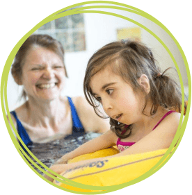 Girl with carer in the hydrotherapy pool