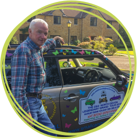 Terry Baker with his beloved Mini at Children's Hospice South West's Little Bridge House hospice in North Devon