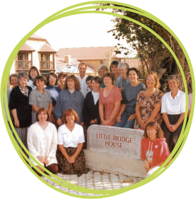 The original CHSW care team pictured outside Little Bridge House in 1995