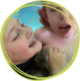 Child and sister in the hydrotherapy pool