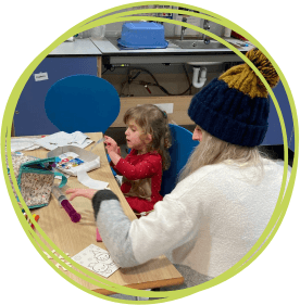 Polly and her mum Peaches enjoying craft activities at Little Bridge House