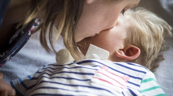 Boy with Mum kiss