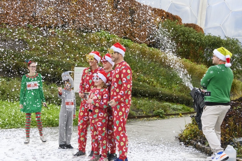 Family at the Eden Project dressed in Christmas pyjamas