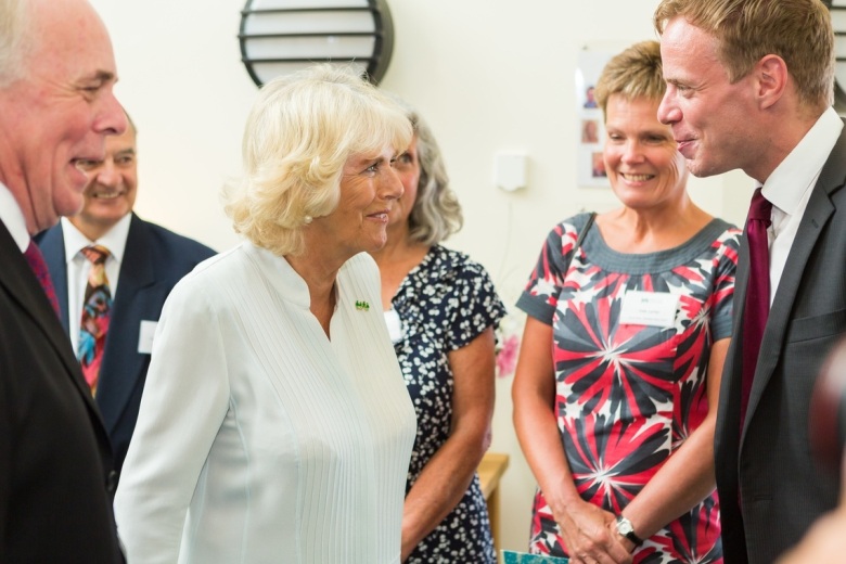 Her Majesty the Queen (formerly HRH The Duchess of Cornwall) meeting staff and guests