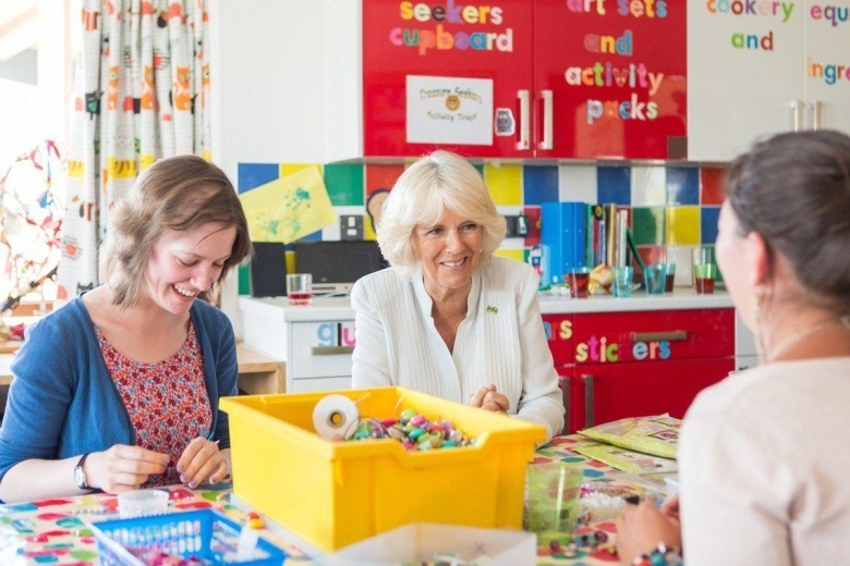 Her Majesty the Queen (formerly HRH The Duchess of Cornwall) meeting staff in the messy play/art therapy room