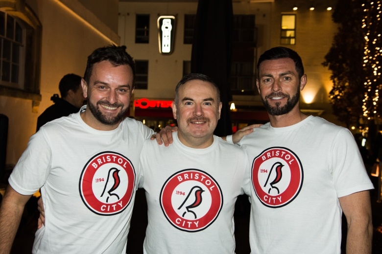 Three Firewalkers smiling and celebrating their firewalk success for CHSW