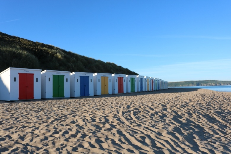 beach huts at woolacombe beach