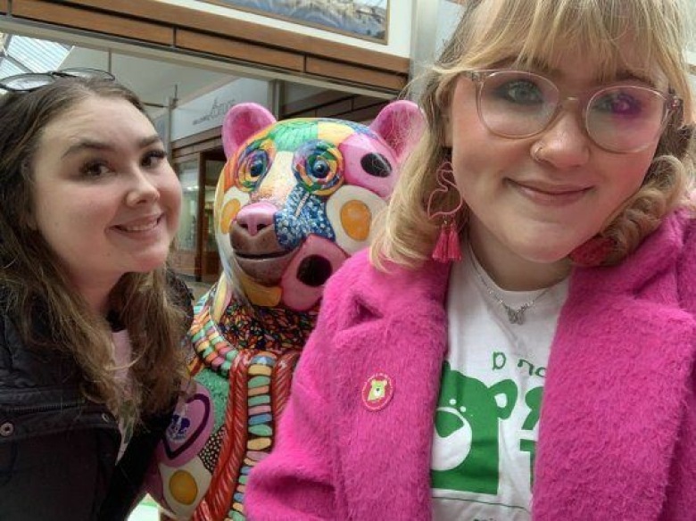 Two young ambassadors with a bear