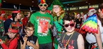 A family at Santas on the Run Eden Project in funky fancy dress thumbnail