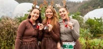 Three women taking part in Santas on the Run Eden Project dressed as reindeer thumbnail