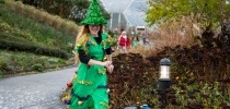 Woman taking part in Santas on the Run Eden Project dressed as a Christmas Tree thumbnail