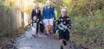 Child running fast in the santa run thumbnail