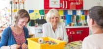 Her Majesty the Queen (formerly HRH The Duchess of Cornwall) meeting staff in the messy play/art therapy room thumbnail