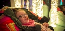 Girl in sensory room smiling thumbnail