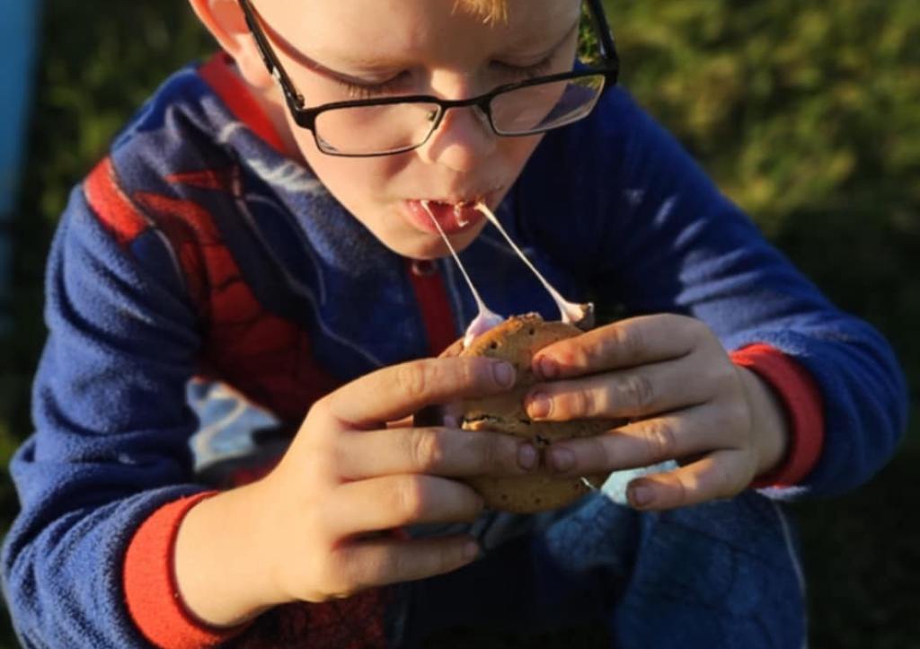 Dude eating a smore