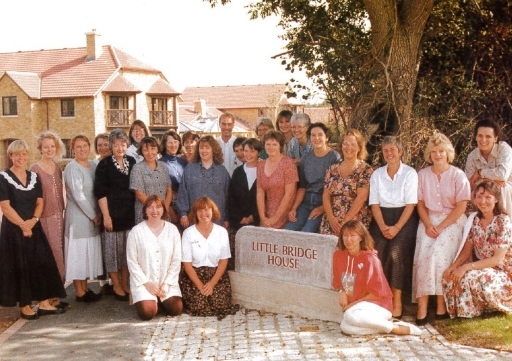 The original CHSW care team pictured outside Little Bridge House in 1995