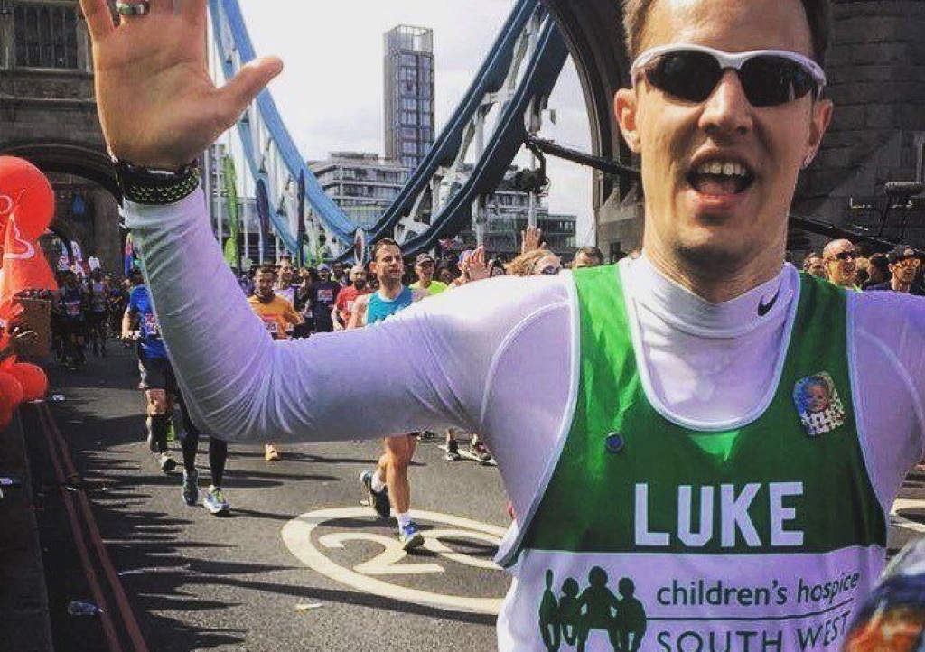 Luke Compton pictured crossing Tower Bridge in the 2017 Virgin Money London Marathon for CHSW