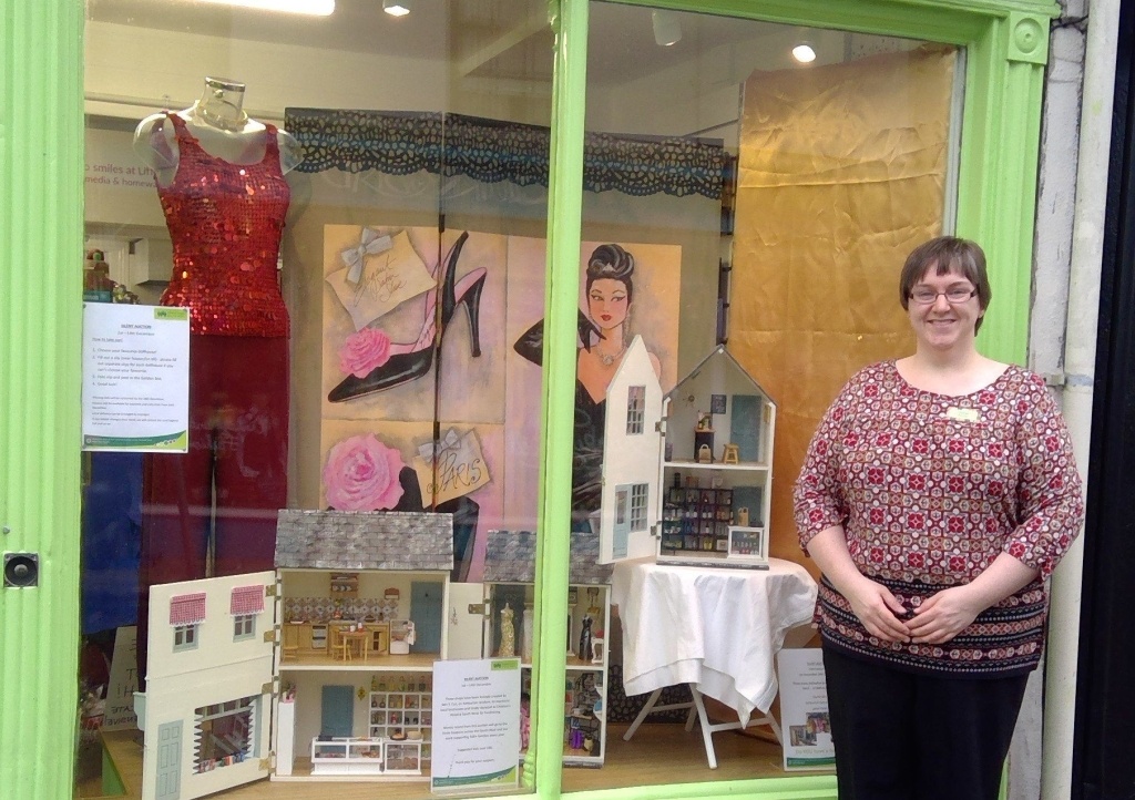 CHSW shop manager Oonagh McAreavy is pictured with the doll’s houses that are based on Ashburton businesses