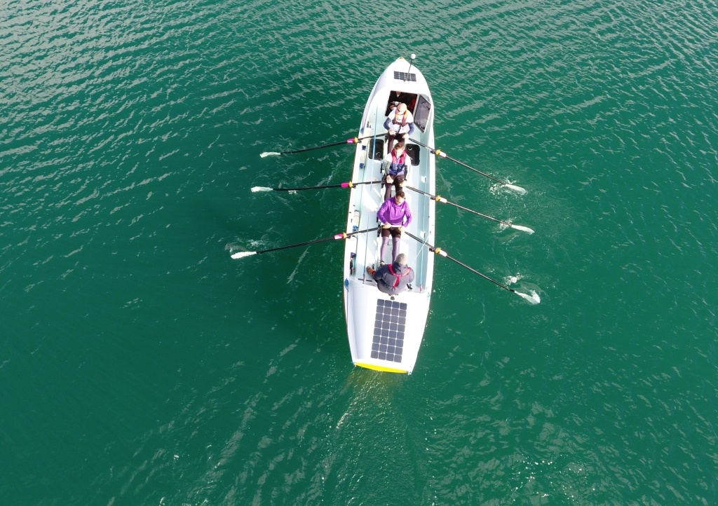 Aerial photo of the Atlantic Seamen rowing their boat in training