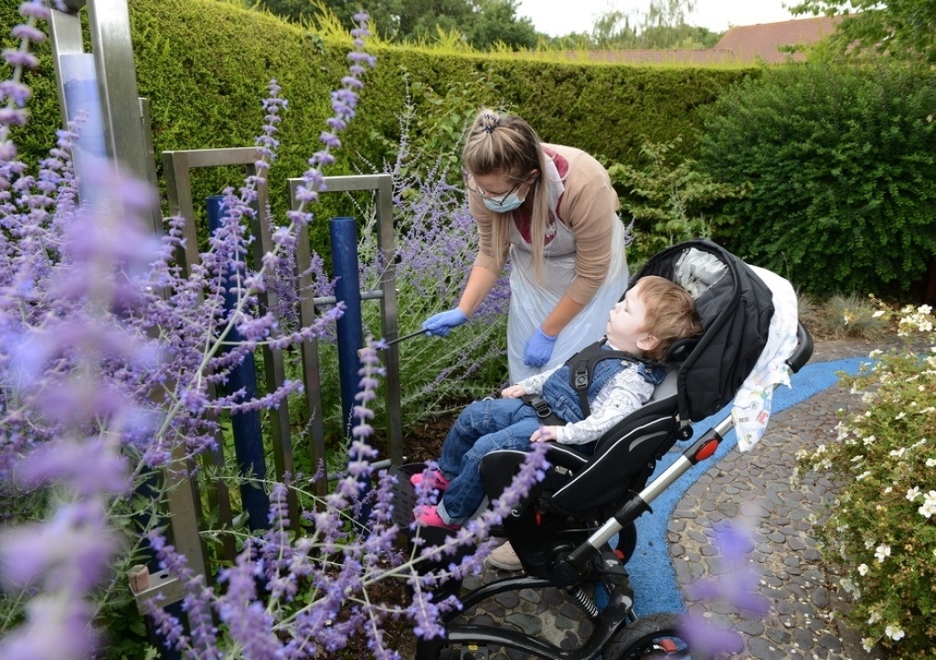 Eleanor and Kasper enjoying the gardens at Little Bridge House