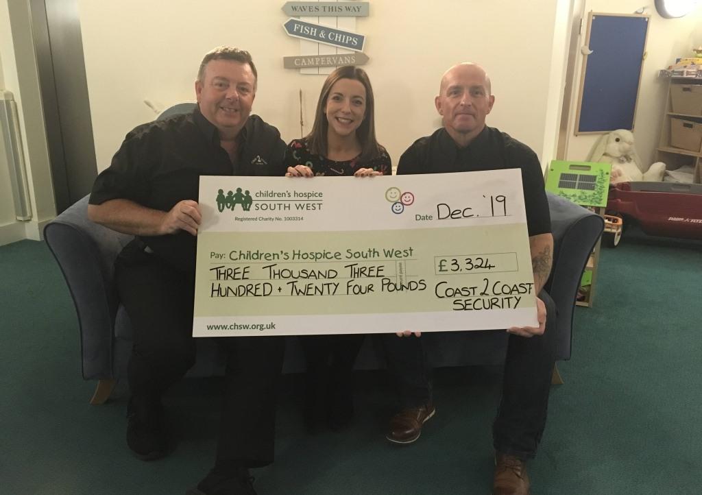 Steve and Mark from Coast 2 Coast handover their donation to Bernadette from Little Harbour