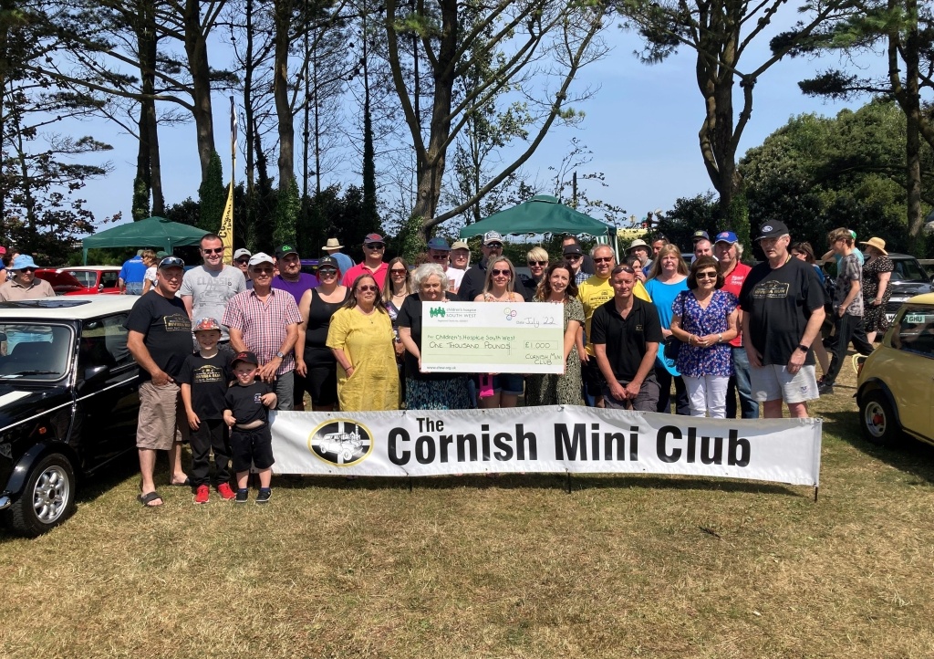 Cornish Mini Club members handover their donation to Bernadette from CHSW