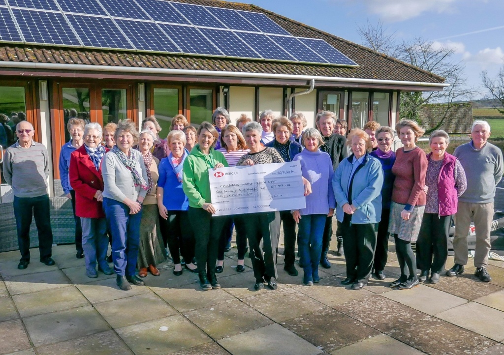 Wendy Walker and fellow members of the Enmore Park Golf Club Ladies’ Section present funds to CHSW