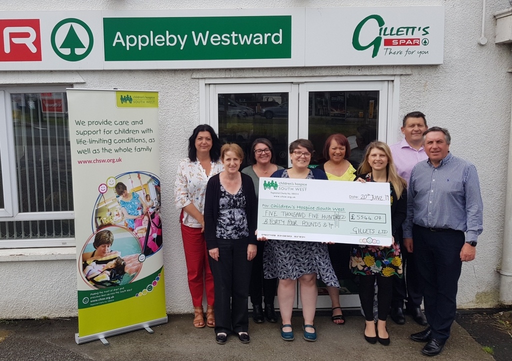 Cheque presentation with representatives from Gilletts who run SPAR stores across Devon and Cornwall