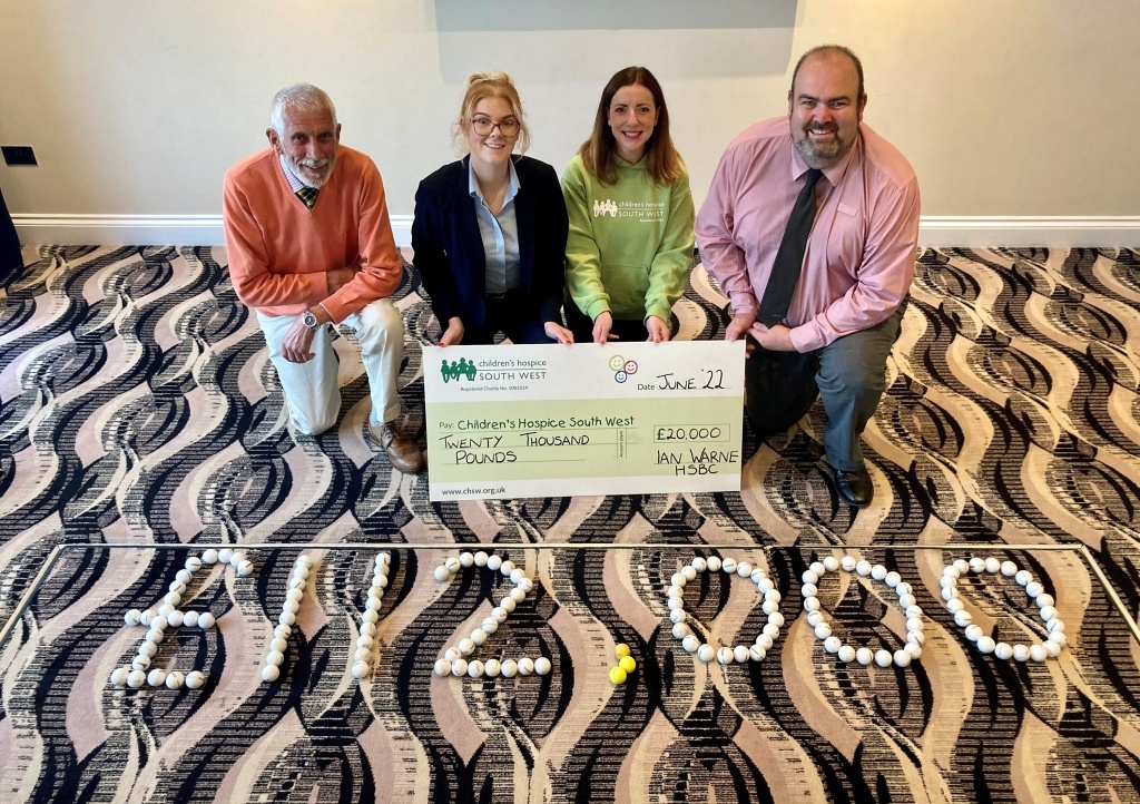 Organisers of the event celebrate £20,000 being raised at the recent golf day