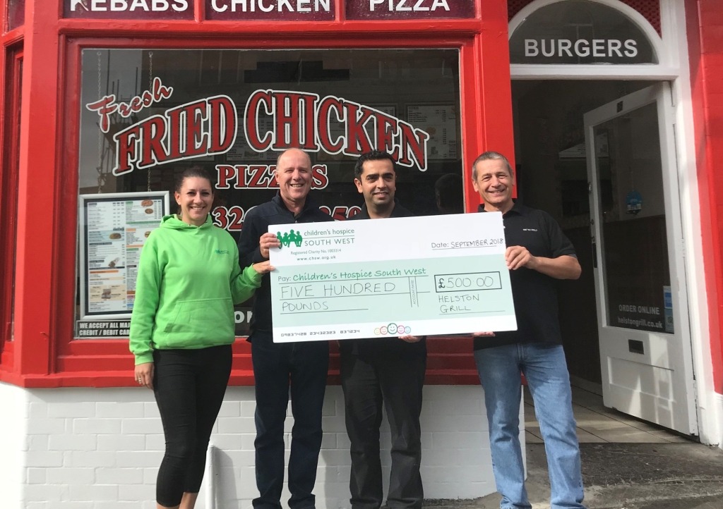 Helston Grill handover £500 to Children's Hospice South West