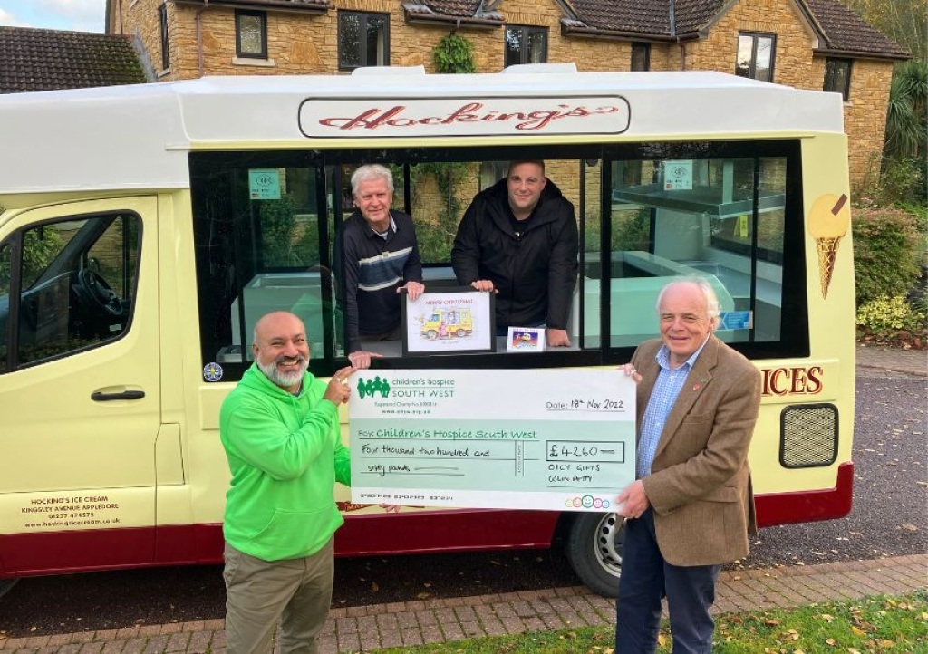 Colin Petty and Daniel Dalley present the fundraising cheque Gubs Hayer and Eddie Farwell