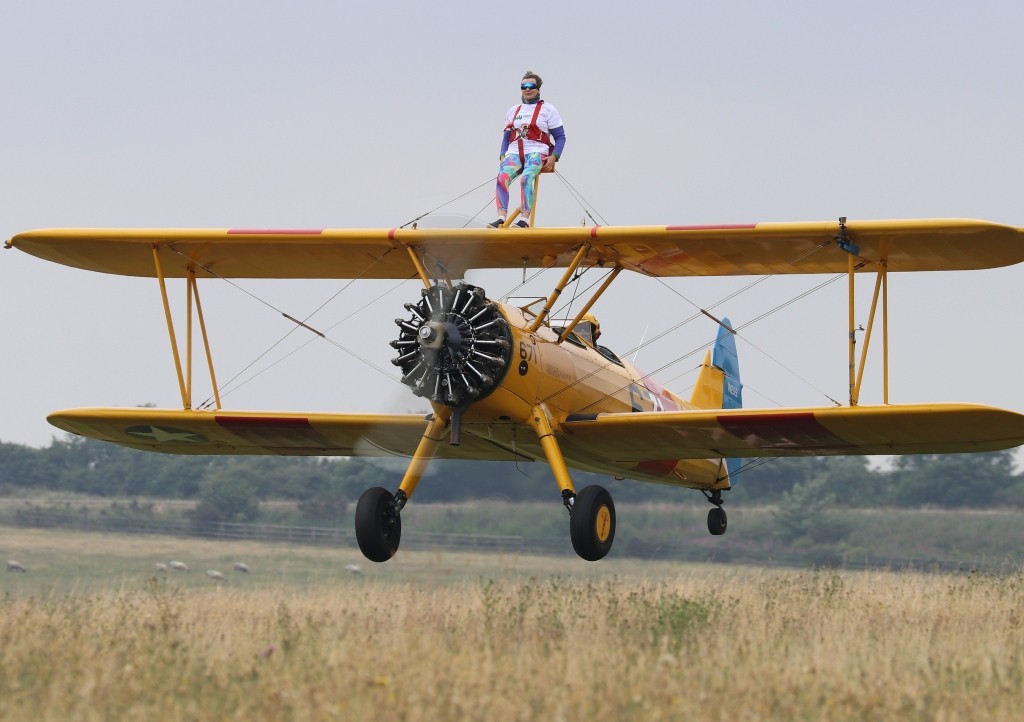 Little Harbour cook Karen, takes to the sky for her wing walk