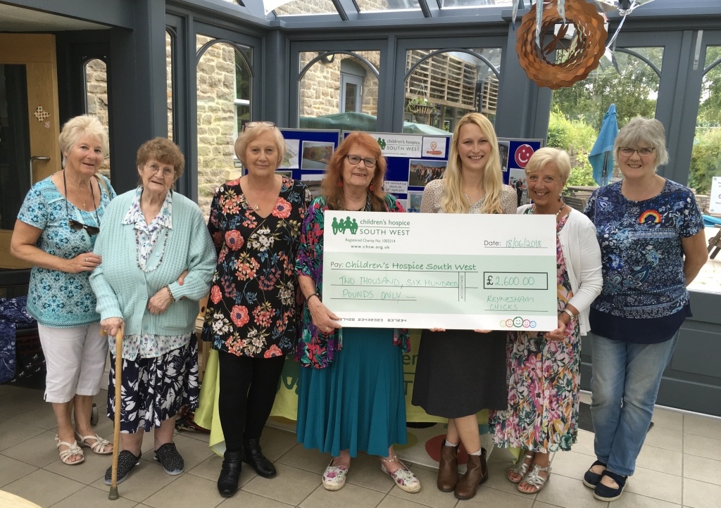 Keynsham-Chicks-present-cheque-to-Charlton Farm