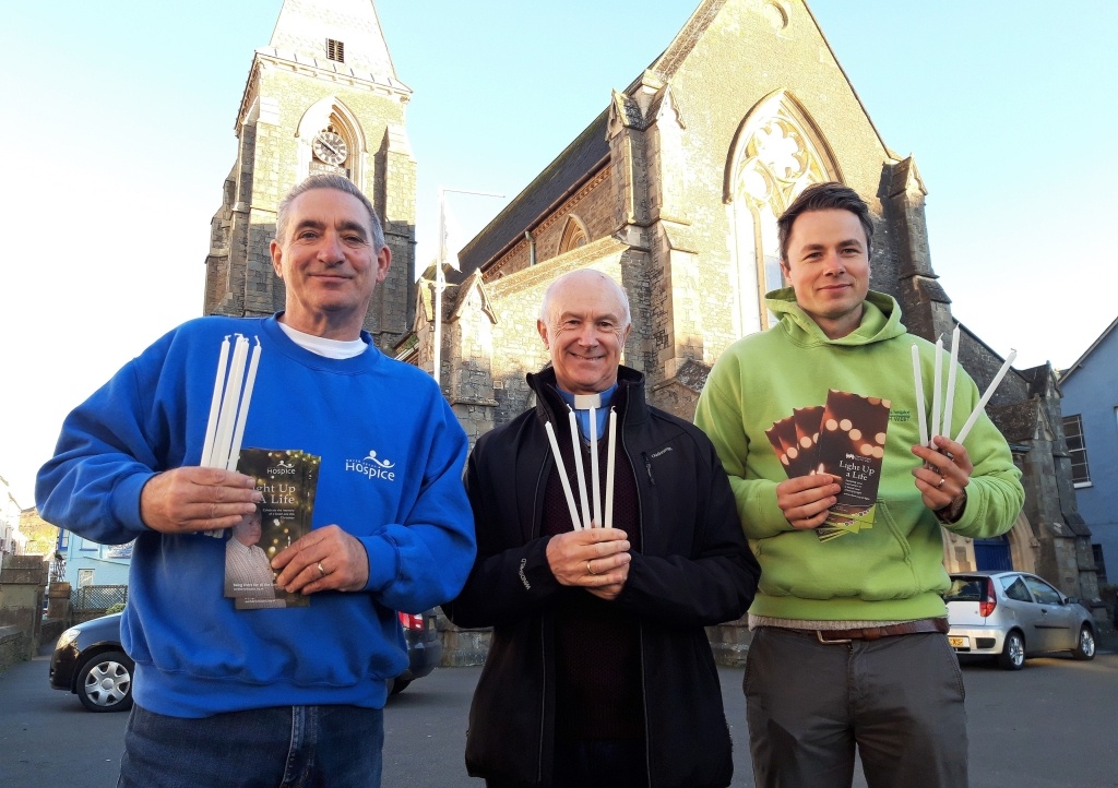 Gerard Fawcitt from North Devon Hospice and Josh Allen from CHSW with the Reverend Clive Thomas