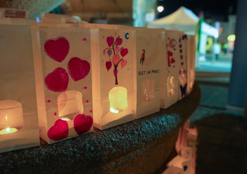Memory bags lit with a tea light decorated in memory of loved ones 