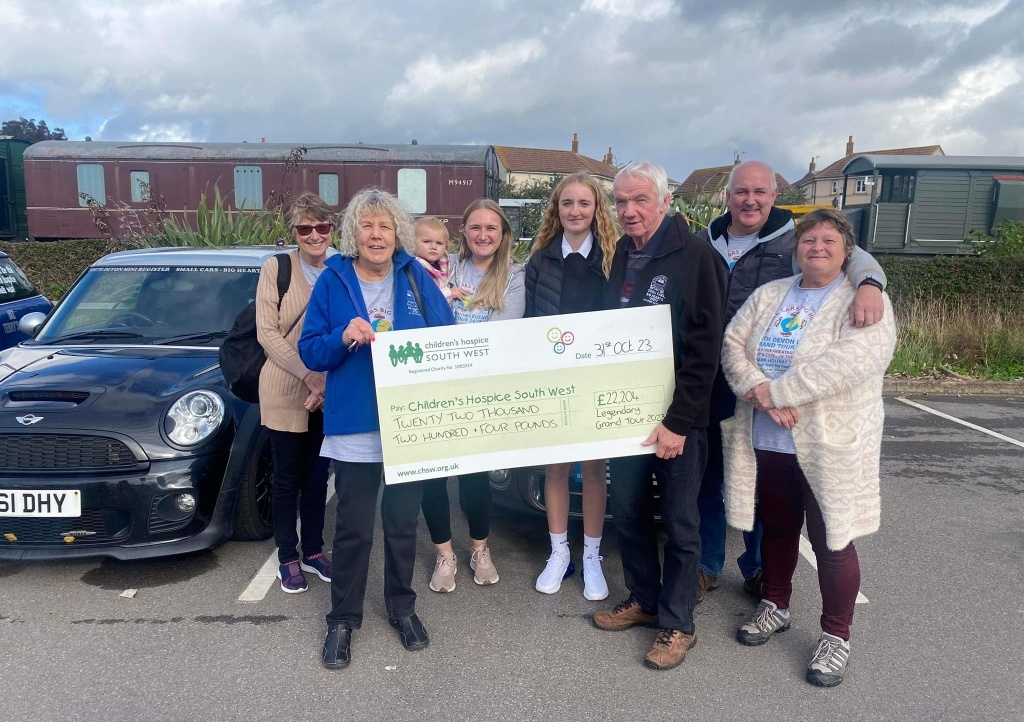 Legendary Grand Tour organisers presenting cheque to CHSW