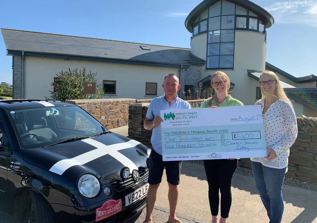 Clare and James handover their donation to Alice at Little Harbour