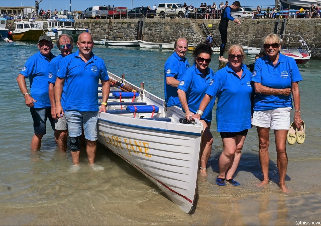 One of the teams standing by their gig before the rowing competition